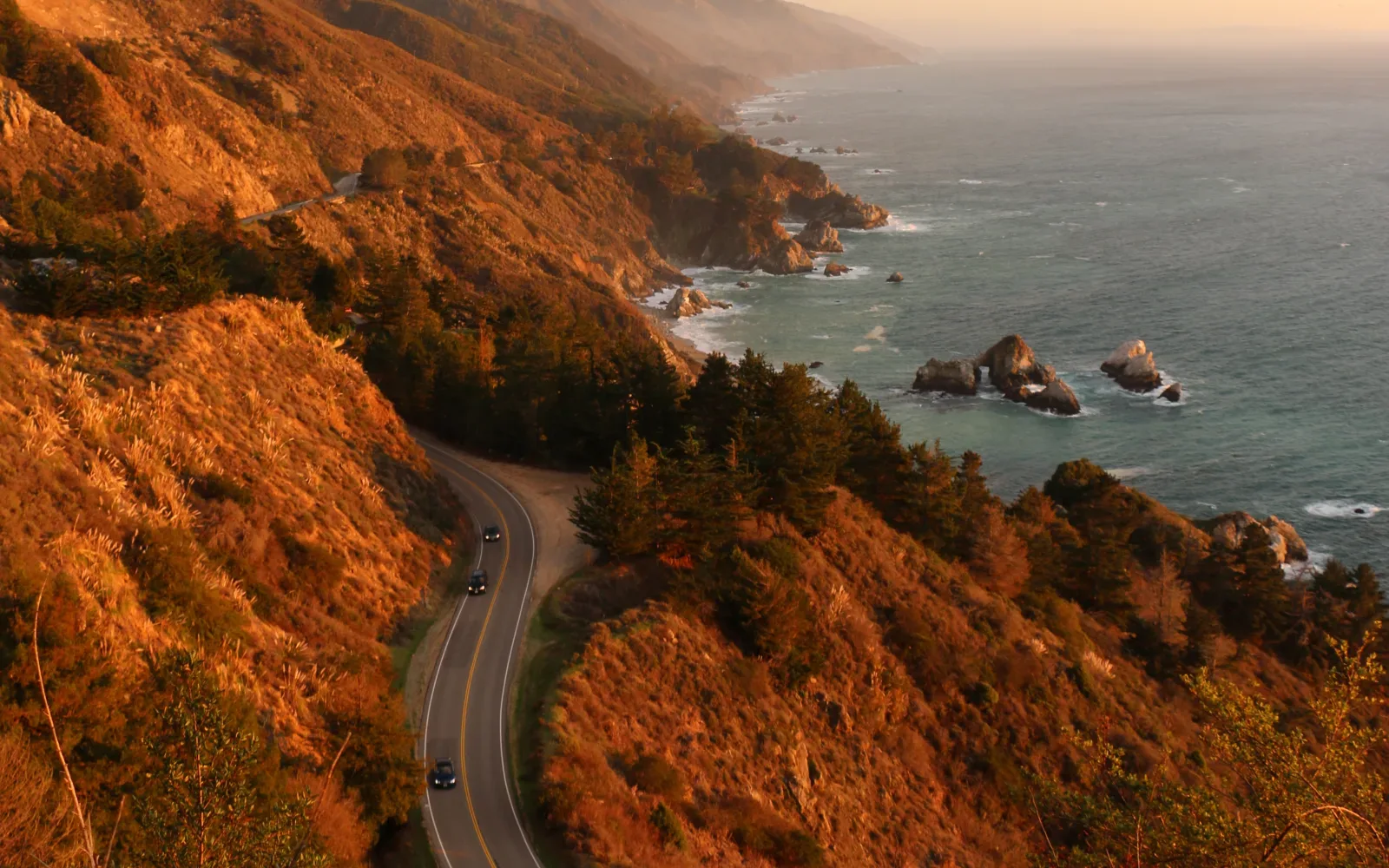 California Highway 1 bending along a steep Pacific coastline